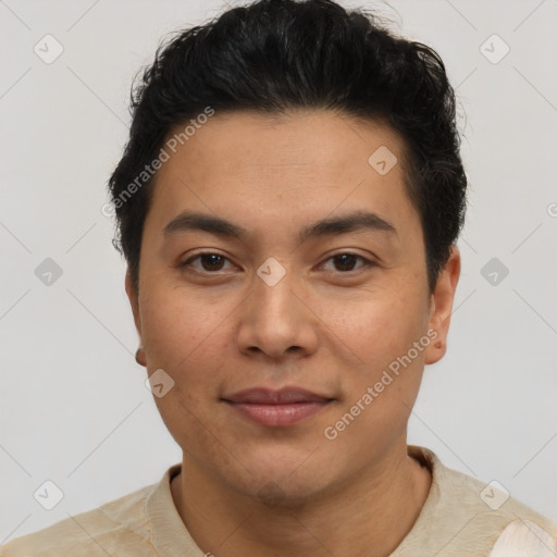 Joyful latino young-adult male with short  black hair and brown eyes