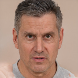 Neutral white middle-aged male with short  brown hair and brown eyes