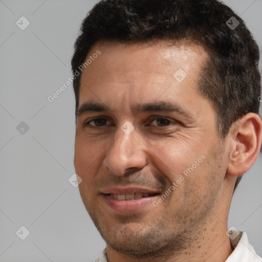 Joyful white adult male with short  brown hair and brown eyes