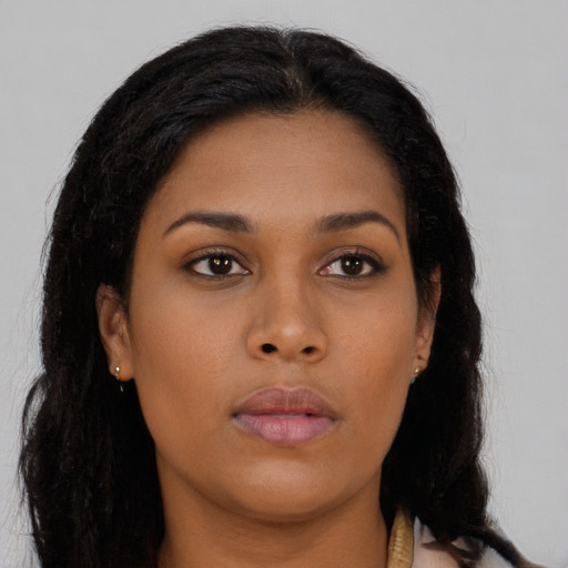 Neutral black young-adult female with long  brown hair and brown eyes