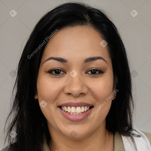 Joyful latino young-adult female with long  brown hair and brown eyes