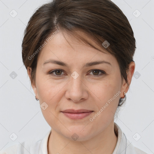 Joyful white young-adult female with medium  brown hair and brown eyes