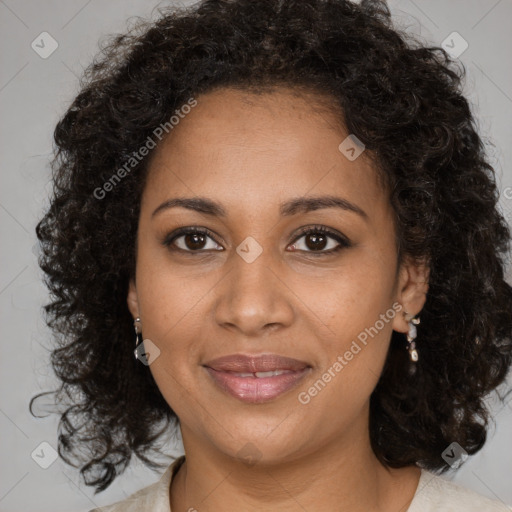 Joyful black young-adult female with medium  brown hair and brown eyes