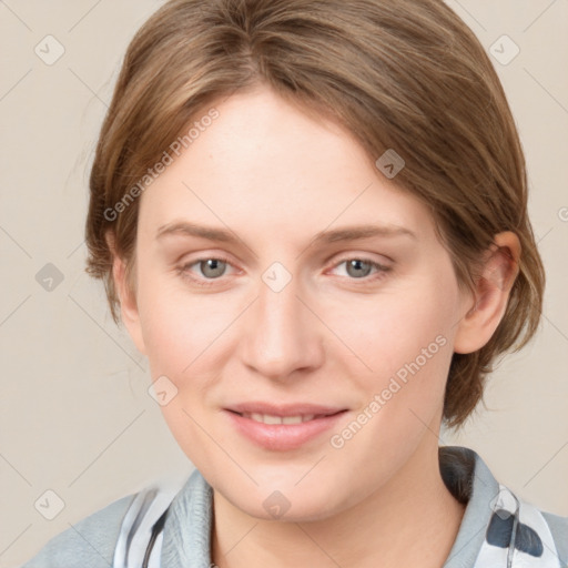 Joyful white young-adult female with medium  brown hair and blue eyes