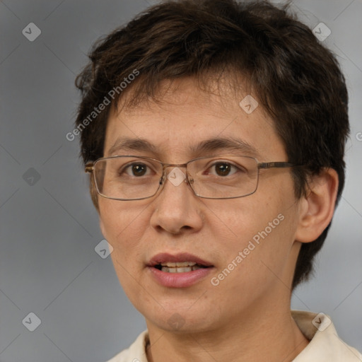 Joyful white adult female with short  brown hair and brown eyes