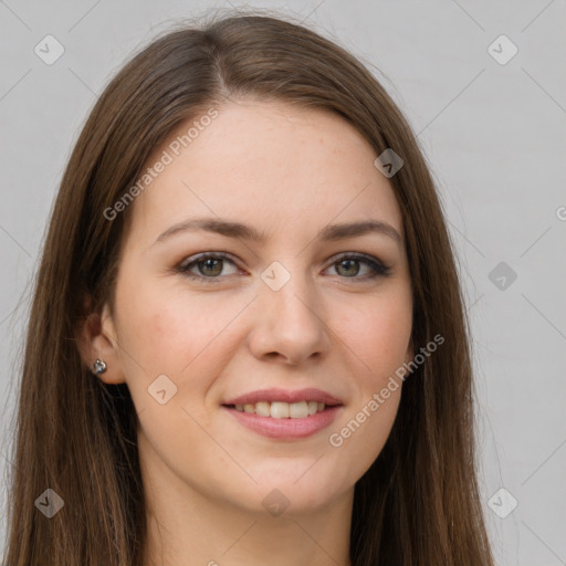 Joyful white young-adult female with long  brown hair and grey eyes