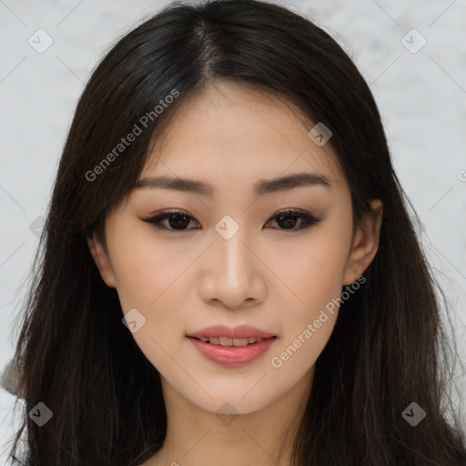 Joyful asian young-adult female with long  brown hair and brown eyes