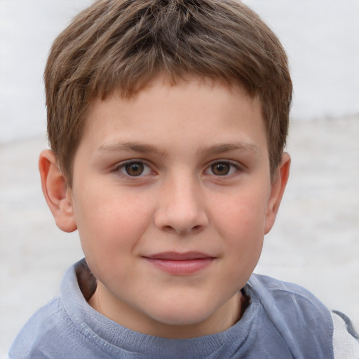 Joyful white child male with short  brown hair and grey eyes