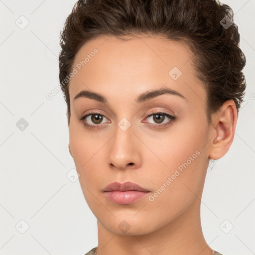 Neutral white young-adult female with short  brown hair and brown eyes