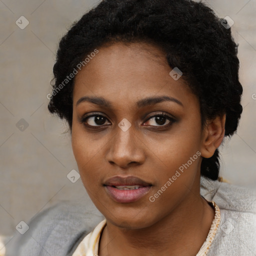 Neutral black young-adult female with short  black hair and brown eyes