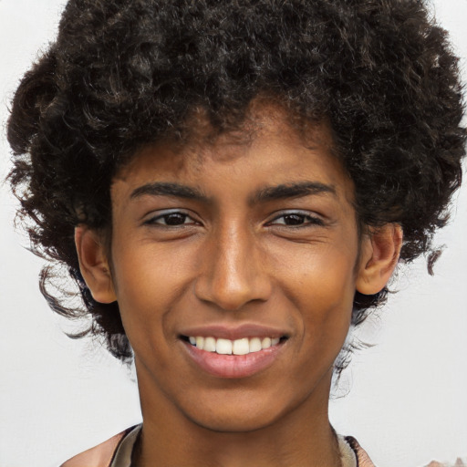 Joyful black young-adult male with short  brown hair and brown eyes