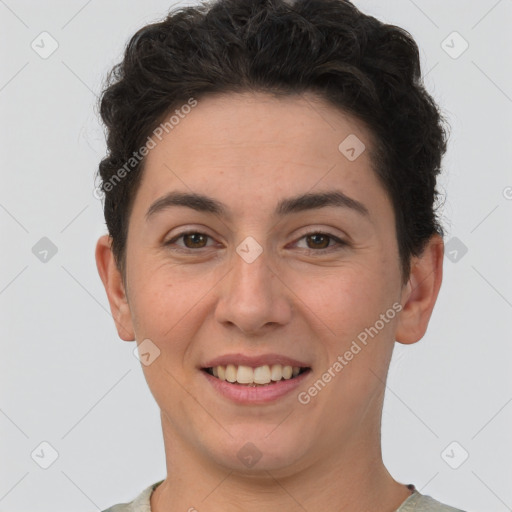 Joyful white young-adult female with short  brown hair and brown eyes