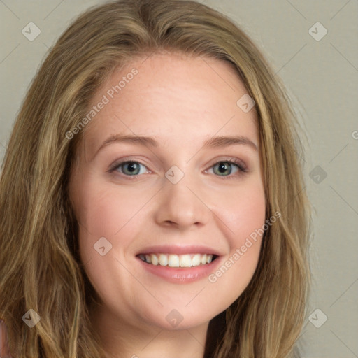 Joyful white young-adult female with long  brown hair and green eyes