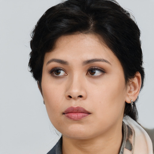 Neutral asian young-adult female with medium  black hair and brown eyes