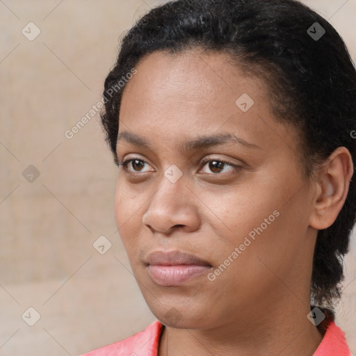 Joyful latino young-adult female with short  black hair and brown eyes