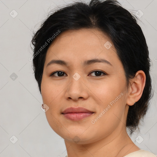 Joyful asian young-adult female with medium  brown hair and brown eyes