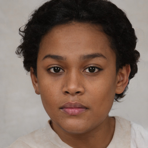 Neutral black young-adult female with short  brown hair and brown eyes