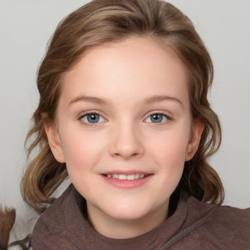 Joyful white child female with medium  brown hair and grey eyes