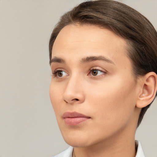 Neutral white young-adult female with short  brown hair and brown eyes