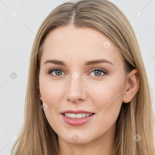 Joyful white young-adult female with long  brown hair and grey eyes