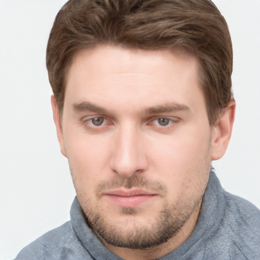 Neutral white young-adult male with short  brown hair and grey eyes