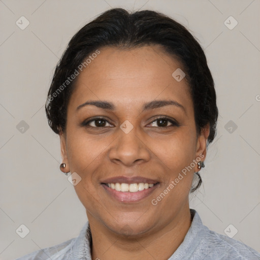 Joyful latino young-adult female with medium  brown hair and brown eyes