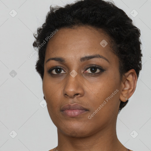 Neutral black young-adult female with short  black hair and brown eyes