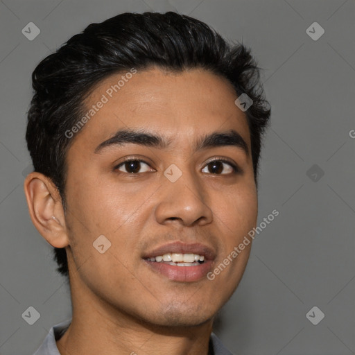 Joyful latino young-adult male with short  brown hair and brown eyes