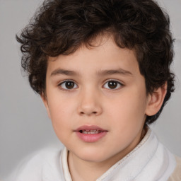 Joyful white child male with short  brown hair and brown eyes