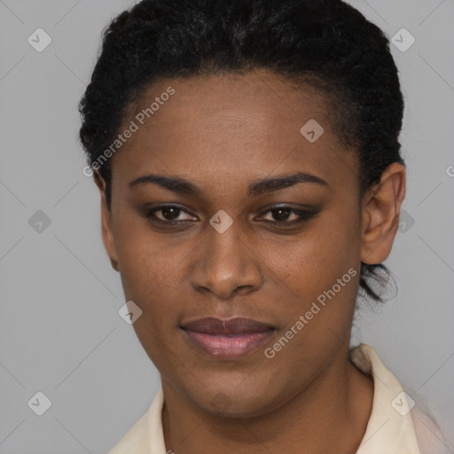 Joyful black young-adult female with short  black hair and brown eyes