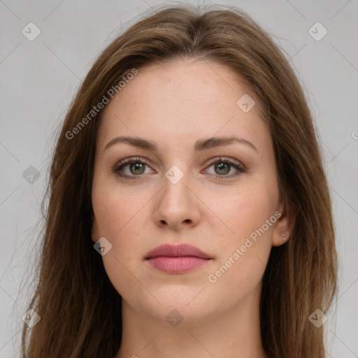 Joyful white young-adult female with long  brown hair and green eyes