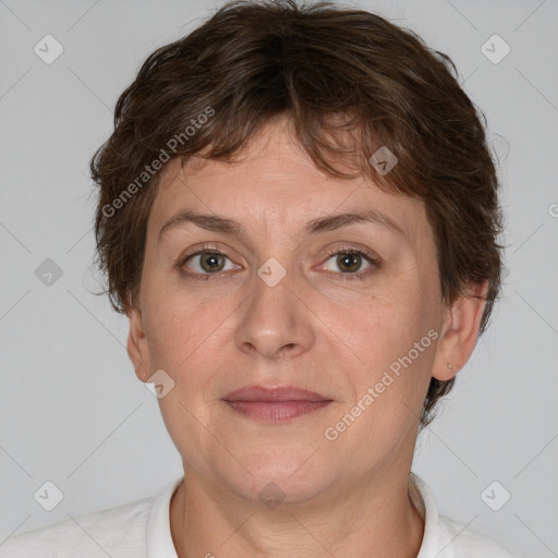 Joyful white adult female with short  brown hair and brown eyes