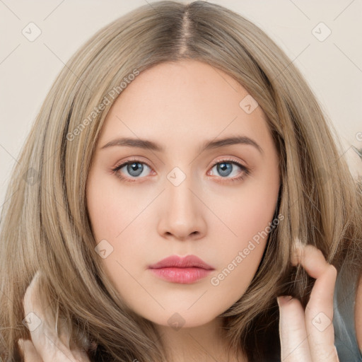 Neutral white young-adult female with long  brown hair and brown eyes