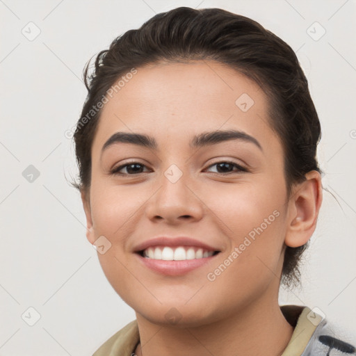 Joyful white young-adult female with short  brown hair and brown eyes