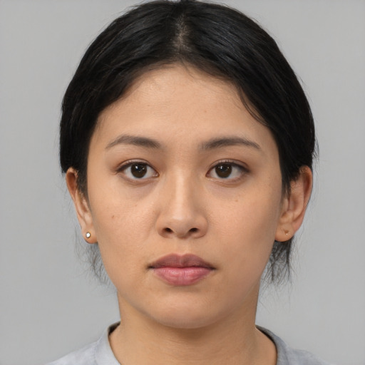 Neutral asian young-adult female with medium  black hair and brown eyes