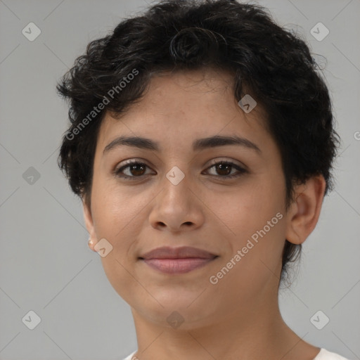 Joyful latino young-adult female with short  brown hair and brown eyes