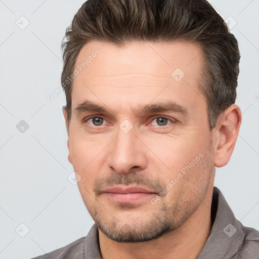 Neutral white adult male with short  brown hair and brown eyes