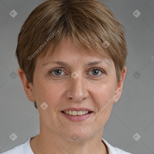 Joyful white adult female with short  brown hair and brown eyes