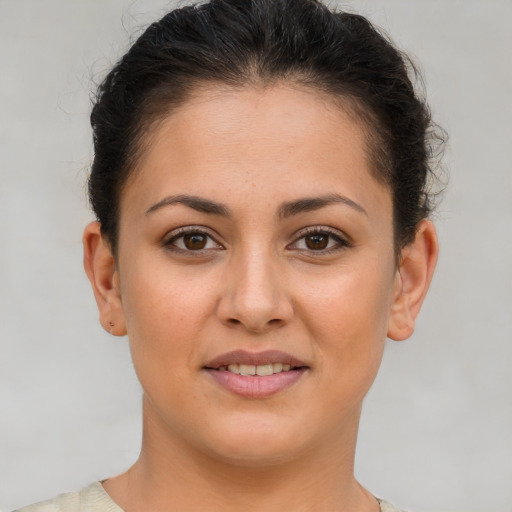 Joyful white young-adult female with short  brown hair and brown eyes