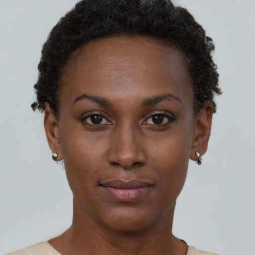 Neutral black young-adult female with short  brown hair and brown eyes