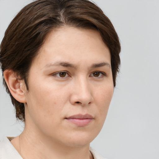 Neutral white young-adult female with short  brown hair and brown eyes