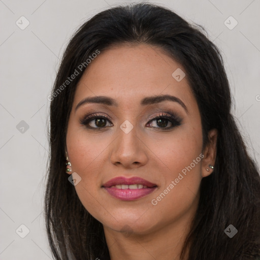 Joyful latino young-adult female with long  brown hair and brown eyes