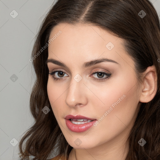 Neutral white young-adult female with long  brown hair and brown eyes