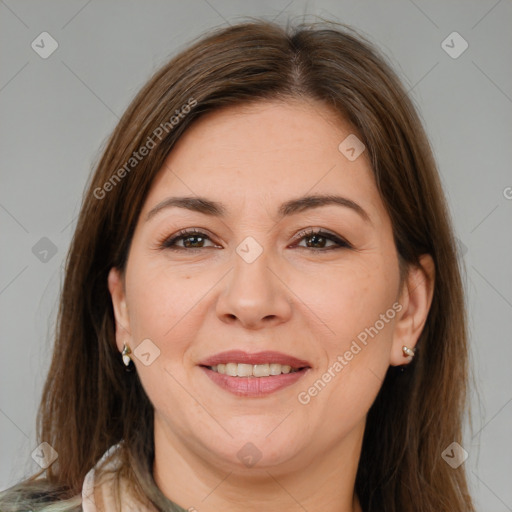 Joyful white adult female with medium  brown hair and brown eyes