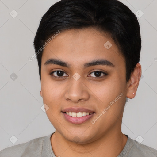 Joyful asian young-adult female with short  brown hair and brown eyes