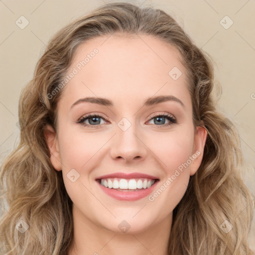 Joyful white young-adult female with long  brown hair and green eyes