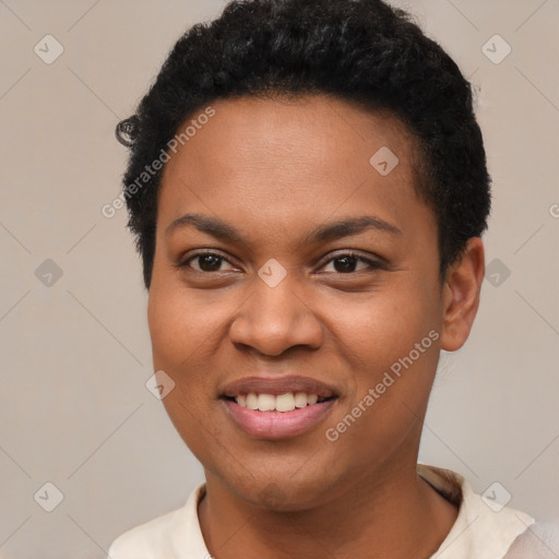 Joyful black young-adult female with short  brown hair and brown eyes