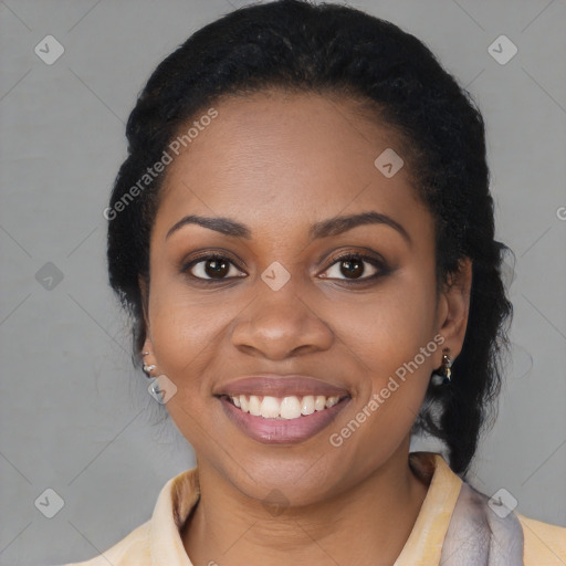 Joyful black young-adult female with medium  black hair and brown eyes