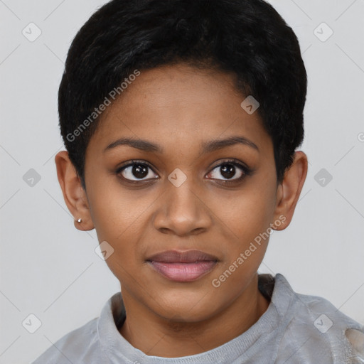 Joyful black young-adult female with short  black hair and brown eyes