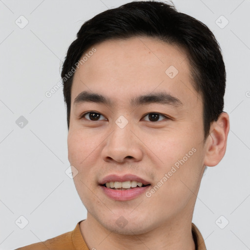 Joyful white young-adult male with short  black hair and brown eyes